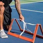 An image of a man setting up his penalty box.