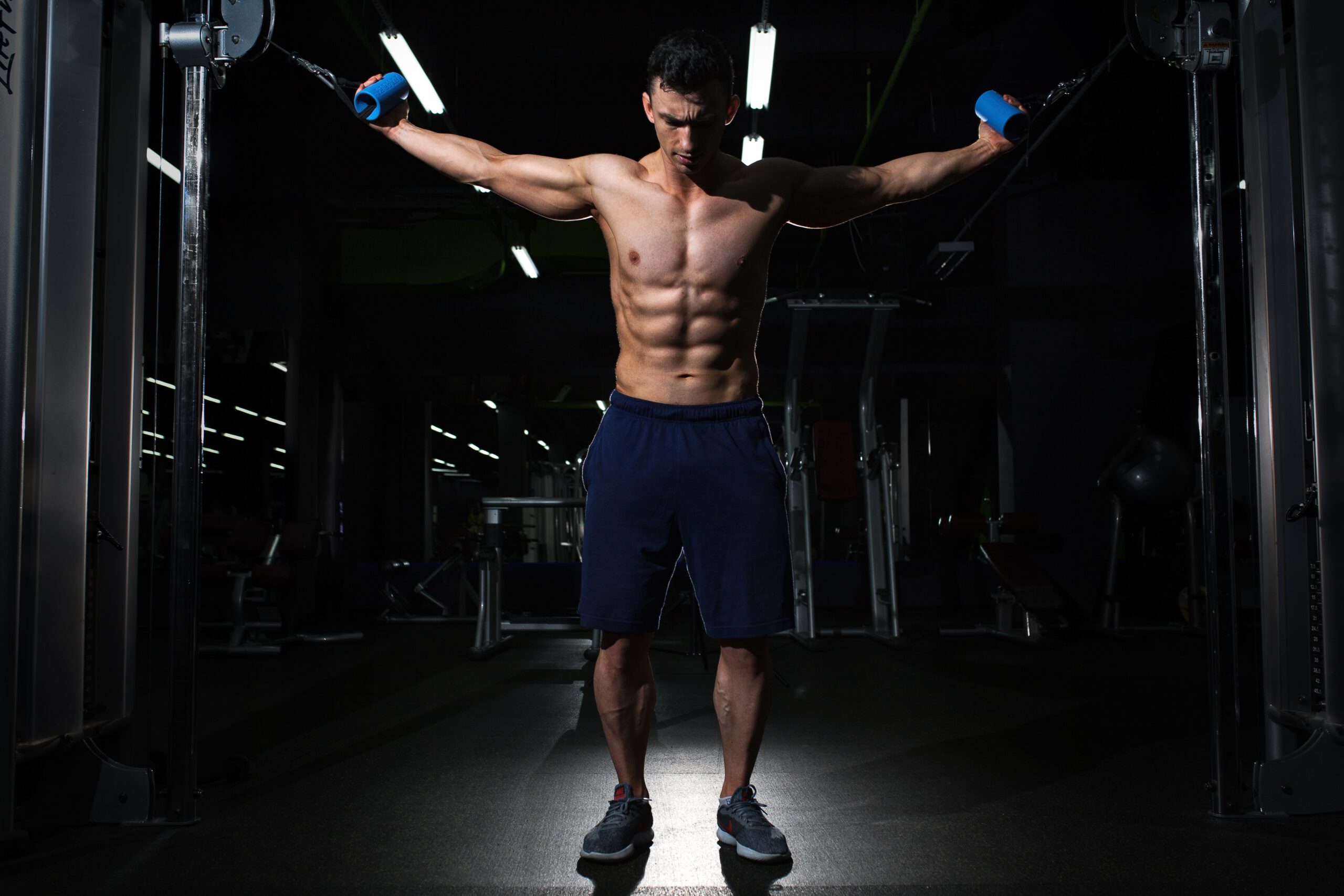 Man holding on to row excercise machine.