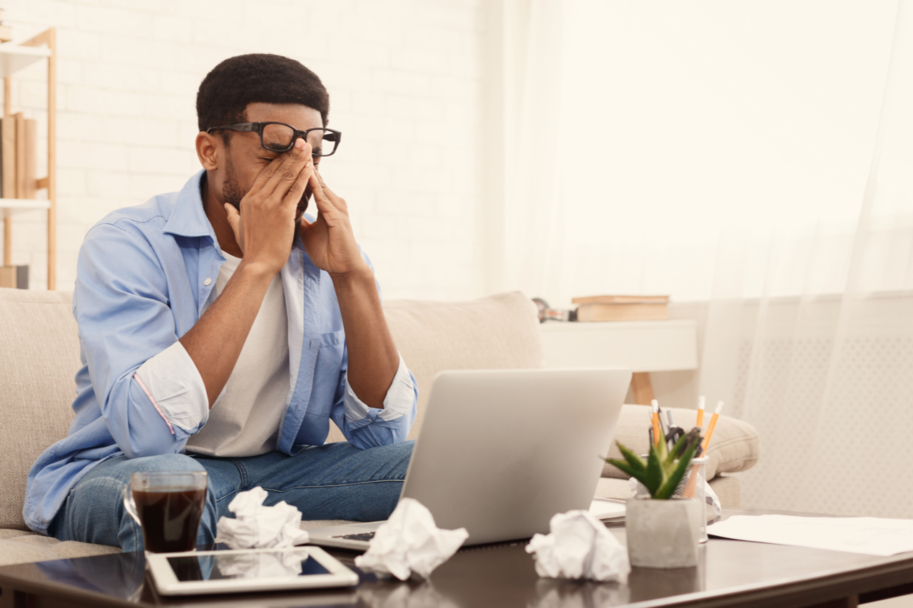 A man having a headache due to stress