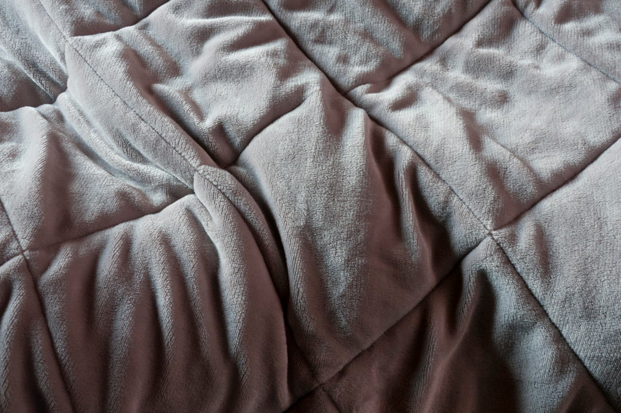 Grey weighted blanket. What is a weighted blanket?