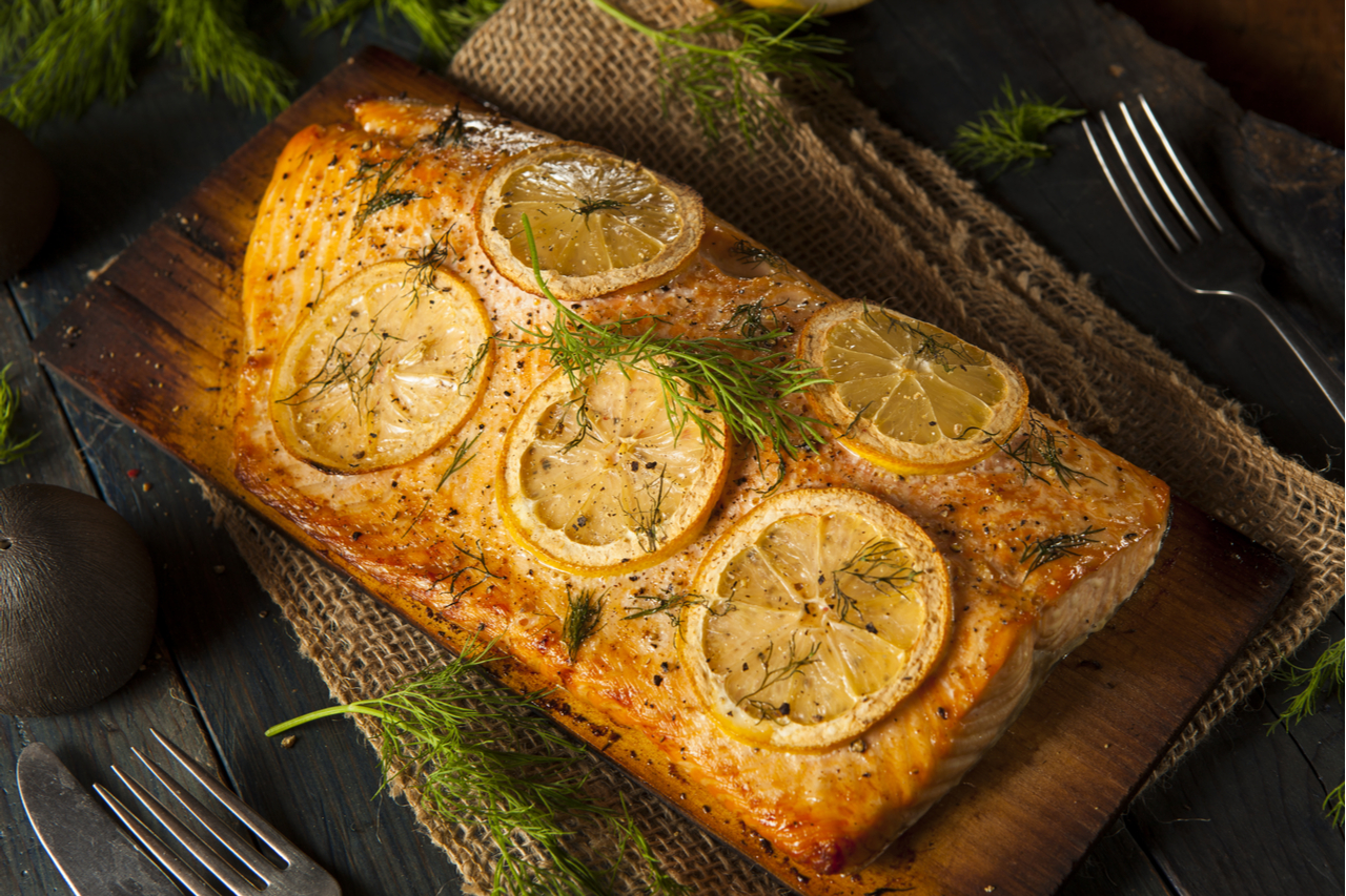 Homemade Grilled Salmon on a Cedar Plank with Dill.