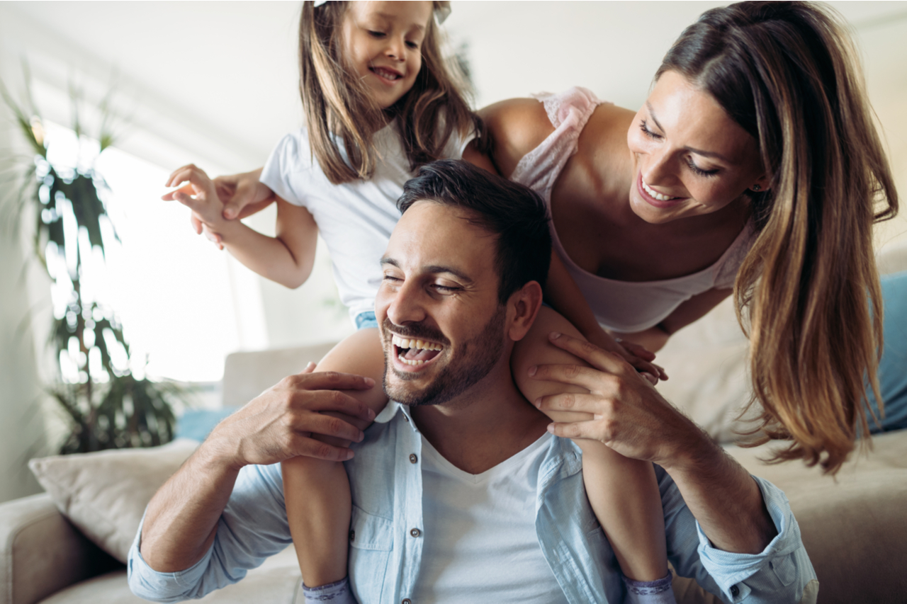 Happy family having fun time at home.