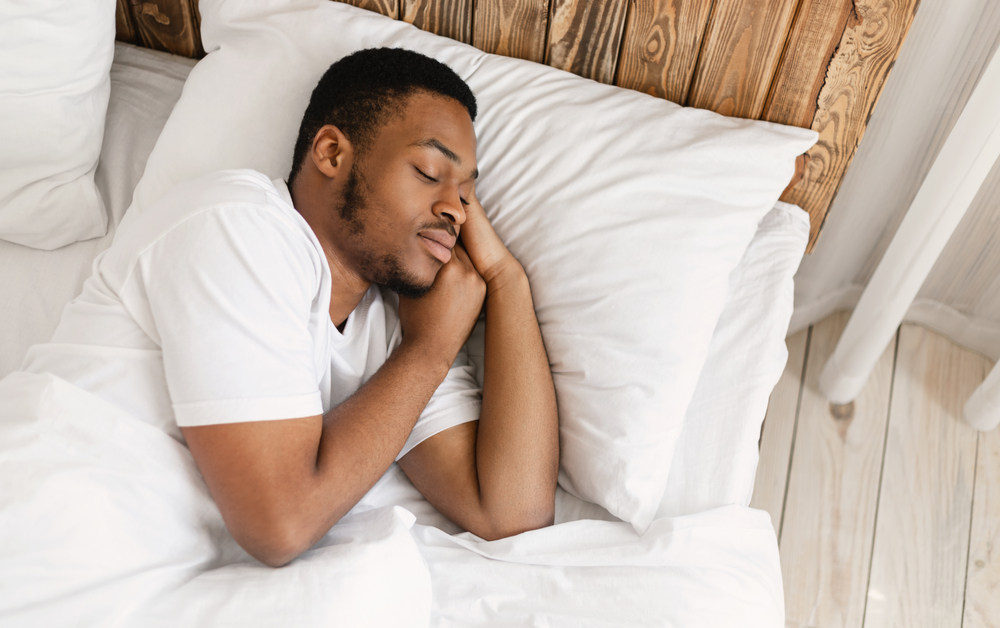 Resting with eyes closed lying in comfortable bed